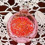 pallina gioiello rosa decorata con perline