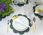 rolling up fresh flowers inside a napkin
