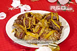 Orange duck served in a platter