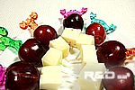 Cherries and cheese on skewers