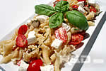 Cold pasta dish in a rectangular platter for your summer meals