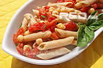 Healthy pasta salad with tomatoes and chickpeas