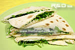 Italian piadina stuffed with arugula and mozzarella