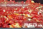Baked lamb with potatoes, onions and tomatoes (Basilicata)