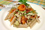 Pasta salad with salmon and artichokes in oil