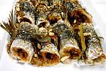 Beccafico sardines served in a white platter, Sicilian recipe