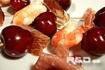 Cherries and cheese on skewers