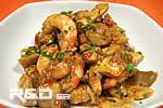 Chicken stewed together with sausage and prawns