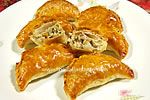 Puff pastry appetizers filled with anchovies