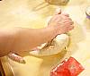 continue kneading pizza dough