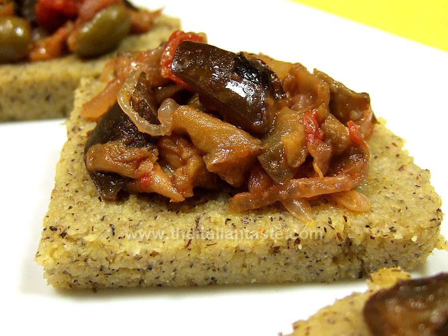Eggplant caponata topped polenta canapés